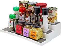 the spice rack is organized with spices and seasonings