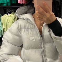 Nike Sportswear Therma Fit Puffer Jacket Size: Kids Medium Nike White Puffer Jacket Brand New With Tags : Retail $145 I’m 5’3 103 Pounds For Reference When I’m Wearing It In The Photos , Chest Area Fits Amazing But Arm Length Definitely A Bit Short Because Its Kids Size Color: Photon Dust , White A Beautiful Iridescent White Comes Off A Bit Blue , A Bit Silver, A Bit White In Different Lighting! Photo Colors Are Accurate Its Super Warm And Thick, High Quality Jacket Home Depot Box Nike Puffer Jacket White, Nike Puffer Jacket Outfit, Puffer Jacket Aesthetic, Nike Puffer Jacket, Nike Puffer, White Puffer Jacket, Puffer Jacket Outfit, Lighting Photo, Jordan Essentials