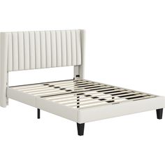 a white bed frame with black and white lines on the headboard, and foot board