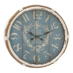 a blue and white clock with rope around it