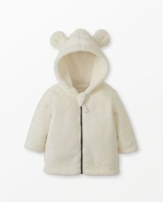 Soft marshmallow fleece jacket washes like magic and the handy zipper won't irritate baby's sensitive skin as your little one bundles up. • Gentle marshmallow fleece • 3-D bear ears on hood • OEKO-TEX® certified safe from hundreds of harsh chemicals 100% recycled poly marshmallow fleece Hood with 3-D bear ears Full zip front with zipper garage so metal never touches skin Locker loop OEKO-TEX® STANDARD 100 | Imported. Baby, Baby Girl Clothes, Outerwear. | Baby Marshmallow Fleece Jacket - Size 6-1 Sherpa Cardigan, Carters Size Chart, Girls Outerwear, Bear Ears, Carters Baby, Baby Warmer, Hanna Andersson, Product Packaging