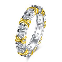 a gold and silver ring with diamonds