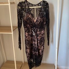 This Is A Black Long Sleeved Lace Dress With A Nude Lining. It Is Brand New! Women’s Size Small. Messages And Offers Welcome! Lace Midi Dress With Sleeves, Small Messages, Satin Wrap Dress, Green Lace Dresses, Geometric Dress, Nude Dress, Pinstripe Dress, Lace Dress With Sleeves, Red Lace Dress