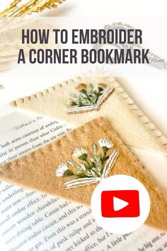 how to embroider a corner bookmark on an open book with text overlay that reads, how to embroider a corner bookmark