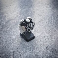 "HIGHEST QUALITY 100% SOLID .925 STERLING SILVER (NOT PLATED). This super cool motorcycle motor ring is handmade. The ring resembles a Harley Davidson Panhead engine motorcycle ring. The difference between a knucklehead and a panhead is The new heads were topped off by redesigned rocker covers which resembled upside-down roasting pans, prompting the nickname \"Panhead.\" Sterling silver men's Biker ring Pan head Engine Big Bike Twin head high polished and antiqued 925 silver ☠STAMP .925 TRADEMAR Black Biker Rings For Biker Events, Black Biker Style Ring As Gift, Biker Skull Ring For Biker Events, Motorcycle Jewelry, Biker Style Skull Jewelry For Gift, Silver Biker Skull Ring For Biker Events, Black Biker Skull Ring Gift, Womens Harley Davidson Jewelry, Biker Rings Mens