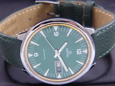 THE MOVEMENT HAS BEEN RECENTLY SERVICED AND IS KEEPING PERFECT TIME ,THE WATCH HAS BEEN REFURBISHED TO LOOK LIKE NEW . DIAL HAS BEEN RE-PAINTED , CASE BACK HAS BEEN POLISHED AND A NEW STRAP HAS BEEN INSTALLED. SEE THE PHOTOGRAPHS FOR ANY DEFECTS. VINTAGE ROAMER MUSTANG AUTOMATIC SWISS MENS DAY/DATE GREEN DIAL WATCH a52979-1 Vintage(1971-1983),Roamer,Automatic,Day,Date, Professionally repainted dial, Stainless steel case & back,Will install a new glass/crystal before dispatch if needed, Mechanical: Automatic,Swiss,Analog,Band width - 20mm, It is in ready to wear condition,6 months seller warranty (contact seller to claim it). Water resistant : No Green Formal Watch With Date Display, Green Dial Watch, Mens Day, Mens Wrist Watches, Wristwatch Men, Mechanical Watch, Glass Crystal, The Movement, Wrist Watches