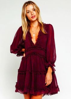 Burgundy Dress - Backless Dress - Cute Ruffle Dress - Mini Dress | Bohopink Update your semi-formal look with the Air of Romance Burgundy Print Dress! Burgundy and plum floral print lightweight fabric forms this cute mini dress. Features plunging v-neckline, attached sheer long sleeves ruffle tiered skirt forms this one of a kind mini dress. Elastic ruffle cuffs and ruffle-trimmed cutout open back finishes the look. Lined. Flirty Puff Sleeve Dress With Smocked Back, Fall Mini Dress With Ruffles And Balloon Sleeves, Puff Sleeve Mini Dress With Ruffles For Date Night, Pink Mini Dress With Ruffles And Lantern Sleeves, Flirty Mini Puff Sleeve Dress With Gathered Sleeves, Fall Mini Dress With Ruffles And Puff Sleeves, Party Mini Dress With Balloon Sleeves And Ruffles, Party Mini Dress With Ruffles And Balloon Sleeves, Balloon Sleeve Ruffled Mini Dress For Party