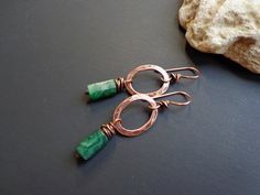 Hammered copper earrings. Hoop earrings. Raw Emerald earrings. Green stone earrings. Rustic earrings. Bohemian earrings. Gemstone earrings. Ethnic earrings. Rustic earrings. Artisan earrings Handmade. The copper parts of these earrings are hand-hammered, hand-shaped, oxidized and wax polished. The ear wires are handmade from pure copper wire. ● Materials: Natural stone, Copper ● Measures: - Length- about 2 inches (5 cm) x 0.59 inches (1.5 cm). ✿ All my jewelry is my own original design and handc Copper Earrings Handmade, Hammered Copper Earrings, Earrings Small Hoop, Raw Stone Earring, Raw Emerald, Rustic Earrings, Earrings Emerald, Natural Stone Earrings, Copper Art