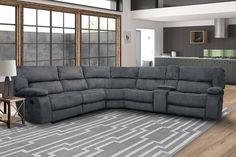 a large gray sectional couch in a living room