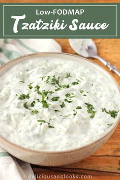 low fodmap tatzziki sauce in a bowl with parsley on top