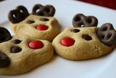 some cookies with reindeer noses and chocolate chips