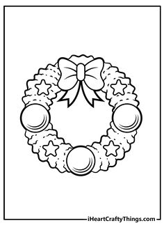 a black and white christmas wreath with bells on it, in the shape of a bow