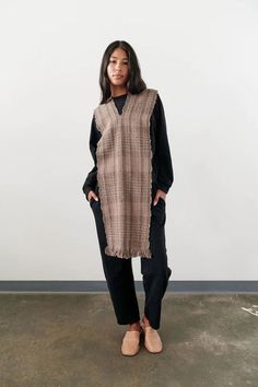 Lightweight yet substantial soft woven poncho in a wide silhouette. Open front so can be worn cape-like or wrapped over the shoulder like an oversized scarf. Woven by our artisan partners in a mix of warm-handed, textured alpaca & cotton blend yarns. 44% Alpaca, 30% Organic Cotton, 26% Hand Spun Cotton Hand woven in Peru with our Fair Trade factory Handwoven Wool Poncho For Fall, Fall Handwoven Shawl Cape, Fall Handwoven Cape Shawl, Fall Woven Shawl Poncho, Handwoven Brown Poncho For Fall, Handwoven Brown Fall Poncho, Handwoven Fall Poncho Shawl, Handwoven Fall Shawl Poncho, Oversized Scarf