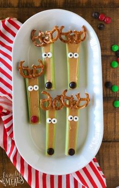 some pretzel sticks with reindeer noses on them