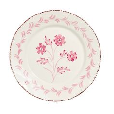 a pink and white plate with flowers on it