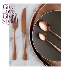 two forks and spoons on a plate with the words give love, give style