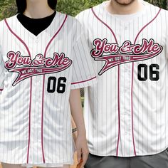 Celebrate your love with the "You & Me We Got This Matching Couples Stripe Line - Personalized Baseball Jersey". This custom name and number shirt is perfect for showing off your bond during baseball season. Ideal for him and her, these matching couples jerseys make great outfits for any occasion. Whether it’s a Valentine’s Day gift, an anniversary gift, or just a thoughtful gift for your boyfriend, girlfriend, husband, or wife, these personalized jerseys are sure to impress. Perfect for any couple looking to sport their love, these jerseys are the ultimate gift for couples who want to celebrate their unique connection.MESSAGE: You & Me We Got This. PRODUCT DETAILS: Material: High-quality polyester for a lightweight, breathable feel that wicks away moisture. Our baseball jerseys are prepar White Baseball Jersey With Letter Print For Game Day, White Baseball Jersey With Name Print For Game Day, White Baseball Jersey With Letter Print, White Baseball Jersey With Name Print, White Short Sleeve Baseball Jersey For Baseball Season, White Baseball Jersey With Sublimation Print For Fans, Custom Print White Baseball Jersey For Baseball Season, White Baseball Jersey With Custom Print, White Baseball Collar T-shirt With Letter Print