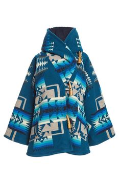 Most Orders Ship within 1-2 Business Days Fully lined bell-shaped hooded cloak with welt patch pockets and three toggle closure. Unnapped Pendleton blankets: 82% Wool, 18% Cotton. Wool Cashmere facings and Silk Rayon peachskin lining. First woven in the 1920s, this USA-made wool blanket has been one of Pendleton's most popular designs ever since Chief Joseph led the Nez Perce tribe native to northeastern Oregon in the late 1800s. Widely admired for protecting his people and speaking the truth, h Joseph Coat, Pendleton Blankets, Speaking The Truth, Chief Joseph, Pendleton Blanket, Blanket Coat, Sweat Dress, Hooded Cloak, Pendleton Wool