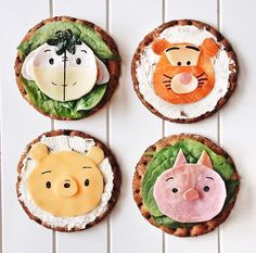 three small sandwiches decorated to look like animals