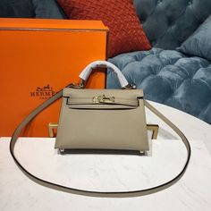 HM Mini Kelly Trench For Women Gold Toned Hardware 7.5in/19cm Mini Kelly, Louis Vuitton Shirt, Togo Leather, Kelly Bag, Hermes Bags, Evening Clutch Bag, Hermes Bag, Tote Backpack, Bag Tags