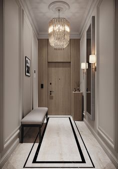 the hallway is clean and ready for guests to use it as an entrance way in this modern home