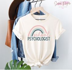 School Psychologist Shirt- School Psych Shirt- School Psych Gifts- School Psychologist Intern- Psicologa Escolar- Gifts for School Psychologists ♥DESCRIPTION This is the perfect shirt for all school psychs! This classic short sleeve t-shirt has a ribbed knit collar to bolster shaping. The shoulders have taping for better fit over time and dual side seams hold the garment's shape for longer. All our shirts are Bella + Canvas unisex shirts, a crowd favorite for their softness and comfortable fit. School Office Decor, Psychologist Office, Education Shirts, Diy Shirt