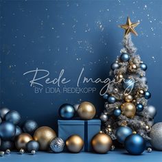 a christmas tree surrounded by blue and gold ornaments with the words rede image by lidia redeckop