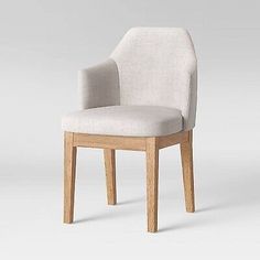 an upholstered chair with a wooden frame and fabric seat padding, viewed from the front