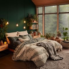 a bedroom with green walls and lots of plants