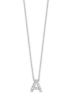 A diamond-studded charm suspended from a delicate chain creates a personalized necklace. 16" length with 2" extender; 1/4" pendant drop Lobster clasp closure Minimum diamond weight: 0.04ct. Color: G Clarity: VS Diamonds/18k gold with rhodium plate Imported Diamond Guide Diamond Initial Pendant Necklace On Cable Chain, Anniversary Diamond Teardrop Pendant Necklace, Diamond Initial Necklace In White Gold For Formal Occasions, Formal White Gold Diamond Initial Necklace, Diamond Initial Pendant Necklace With Adjustable Chain, Elegant Diamond Charm Necklace With Cable Chain, Brilliant Cut Initial Pendant Necklace For Anniversary, Anniversary Necklace With Brilliant Cut Initial Pendant, White Gold Dangle Diamond Necklace Gift