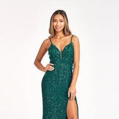 The Beautiful Dress Completely Covered With Sparkling Sequins Will Create A Delightful Image That Will Attract Everyone's Attention. The Open Cut Of The Neck In Combination With The Delicate Cut On The Skirt Makes The Dress Unique And Desirable. Fabric: Sequins Length: Long Colour: Emerald Neckline: Off Shoulder Silhouette: Sheath Sleeve: Sleeveless Back: Open V-Back, Zipper Skirt: Slit Embellishments: Sequins Occasion: Romantic Date/Evening/Dinner, Wedding/Bridesmaid, Graduation, Fashion Show, Emerald Green Dress Prom, Long Emerald Green Dress, Green Dress Prom, Long Sheath Dress, Sleeveless Mermaid Dress, Prom Dress Sleeveless, Graduation Fashion, Dress For Special Occasion, Plus Size Prom Dress