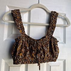 Brown Floral Crop From Garage In A Size Xs! Never Worn Before, Brand New! Ties In The Front :) Perfect For Spring! Brown Cotton Crop Top For Day Out, Brown Casual Crop Top For Beach, Casual Brown Crop Top For Beach, Brown Spring Beach Crop Top, Brown Crop Top For Spring Vacation, Brown Crop Top For Vacation In Spring, Brown Summer Crop Top For Vacation, Summer Brown Crop Top For Vacation, Garage Tops