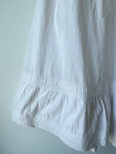 Vintage Victorian White Skirt. Classic crisp white cotton! Doesn't get better than this. In excellent vintage condition, button closure in back. Best fits XS, hand wash cold and line dry. Approximate measurements:Waist: 12" across laying flatLength: 32" Classic Cotton Skirt With Button Closure, Classic Cotton Skirt For Daywear, Cotton Skirt For Daywear, White Buttoned Skirt For Daywear, White Pleated Skirt For Daywear, White Buttoned Bottoms For Daywear, White Cotton Bottoms For Daywear, Vintage White Cotton Bottoms, Vintage White Bottoms For Daywear