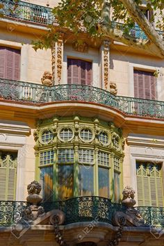 an ornate balcony and balconies on the side of a building