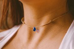 Dainty minimalist teardrop choker necklace. Featuring a cobalt blue glass teardrop on cord. Fully adjustable with a sliding knot closure. CHOOSE YOUR COLOR CORD: ⌁ Tan Cord ⌁ Dark Brown Cord ✺ SIZE GUIDE ✺ ⌁ This choker is designed with a sliding knot closure and will comfortably adjust to a minimum of 13 inches to a maximum of 24 inches. ⌁ How to measure your neck size: If you don't have a seamstress tape measure, take a piece of yarn or string and wrap it around your neck to a comfortable fit Adjustable Minimalist Drop Necklace, Adjustable Teardrop Blue Drop Necklace, Adjustable Blue Teardrop Drop Necklace, Blue Adjustable Drop Necklace As Gift, Minimalist Blue Jewelry With Adjustable Cord, Blue Necklace With Adjustable Waxed Cord, Simple Charm Necklace, Cord Choker, Sliding Knot Closure