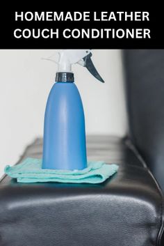 a blue spray bottle sitting on top of a black suitcase