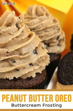 chocolate cupcakes with peanut butter frosting and oreo cookies on the side