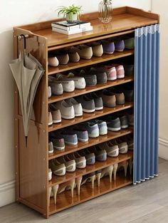 a wooden shoe rack filled with lots of shoes