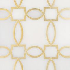 a white wall with gold circles and square shapes on the bottom, in front of a white background