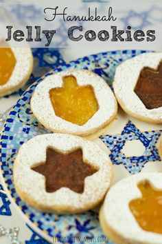 jelly cookies on a blue and white plate with text overlay that reads hanukkah jelly cookies