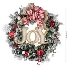 a christmas wreath with the word joy spelled in wood letters and decorations around it on a white background