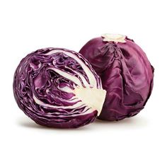 two red cabbages cut in half on a white background