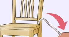 a wooden chair with an arrow pointing to the back of it's seat that is bent down