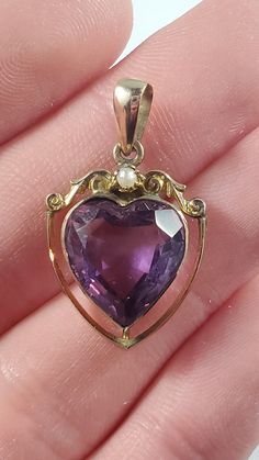 Total size: 1 x 0.75 x 0.2" Total weight: 2.5 grams Marked 9ct Antique Amethyst Jewelry Stamped 14k, Antique Yellow Gold Heart Cut Jewelry, Heirloom 14k Stamped Amethyst Jewelry, Heirloom Heart Cut Gemstone Jewelry, Formal Yellow Gold Gemstone Pendant, Antique Purple 14k Stamped Jewelry, Vintage 14k Gold Purple Jewelry, Amethyst Yellow Gold Jewelry Stamped 14k, Vintage Purple 14k Gold Jewelry