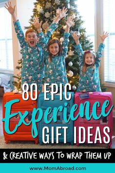 three girls in matching pajamas standing next to a christmas tree with the words 80 epic experience gift ideas and creative ways to wrap them up