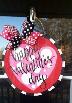 a valentine's day door hanger with a heart