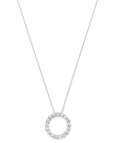 A gorgeous round diamond pendant set in white gold, crafted from a series of brilliant round stones. Diamond Pendant Set, Round Diamond Pendant, Diamond Circle Pendant, Diamond Pendant Sets, Circle Diamond, Circle Pendant, Pendant Set, Diamond Pendant, Round Diamond