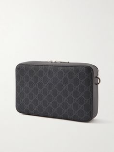 Gucci's bag is made from classic 'GG Supreme' coated-canvas, the motif is based on its logo from the 1930s. Sized to hold your phone, cardholder and other small items, it has a two-way zip fastening and a detachable strap so you have the option to carry it as a clutch. Classic Monogram Canvas Pouch Bag, High-end Monogram Canvas Bag For Formal Occasions, High-end Formal Monogram Canvas Bag, Luxury Monogram Canvas Formal Bag, Formal Shoulder Bag With Removable Pouch In Monogram Canvas, Formal Monogram Canvas Shoulder Bag With Removable Pouch, Formal Monogram Canvas Pouch Shoulder Bag, Formal Monogram Canvas Rectangular Bag, Formal Rectangular Monogram Canvas Bag