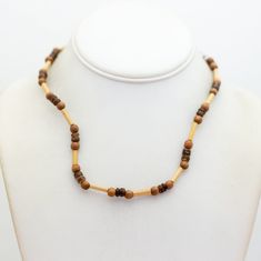 16 inch, Vintage Brown Wooden Beads Unique Choker Necklace  Details Material: Wood Brand: NA Color: Gold Tone, Brown Please refer to the last image for the size of the item with a ruler. Cheap Brown Hand-strung Necklace, Adjustable Brown Beaded Necklaces With Oval Beads, Adjustable Brown Necklaces With Polished Beads, Adjustable Brown Necklace With 8mm Beads, Spiritual Brown Necklace With Spacer Beads, Brown Beaded Necklaces With 8mm Beads As A Gift, Brown Beaded Necklaces With 8mm Beads For Gifts, Brown 8mm Beads Necklace For Gift, Brown Beaded Necklaces As Gifts