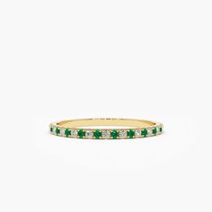 Introducing our stunning 14K Emerald an Diamond Alternating Eternity Ring - a perfect symbol of eternal love and commitment. Crafted with the finest materials, this exquisite ring features alternating emerald and diamond stones set in a classic eternity band design. The vivid green of the emeralds is beautifully complemented by the sparkling white diamonds, creating a timeless and elegant look. Whether as a gift to a loved one or as a well-deserved treat for yourself, this ring is sure to be treasured for a lifetime. Order now and enjoy free shipping and a lifetime warranty.DetailsMade to OrderMaterial: 14k Solid GoldGold Color Choice: Rose Gold, Yellow Gold, White GoldGemstone Cut: RoundGemstone: Whit Diamonds and EmeraldsDiamond Color: D ColorDiamond Clarity: VVS1Diamond Type: Moissanit Silver Diamond Ring, Band Design, Local Jewelry, Ring Stone, Gold Wedding Band, Eternity Band, Micro Pave, Emerald Ring, Emerald Diamond